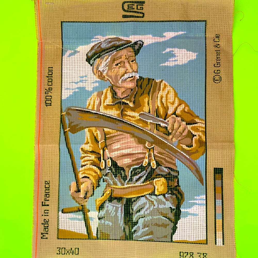 Vintage needlepoint canvas “ sharpening the sickle” this canvas made in France